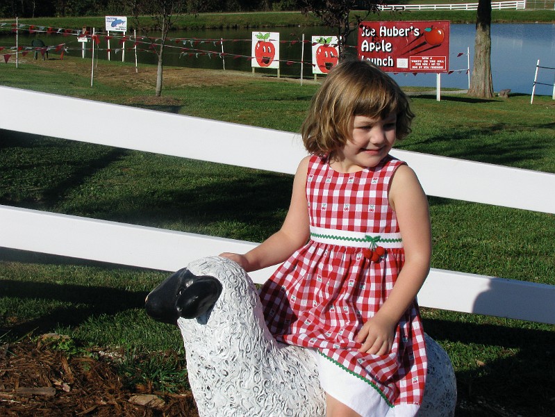 emma_riding_sheep.jpg