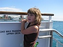 emma_standing_on_boat